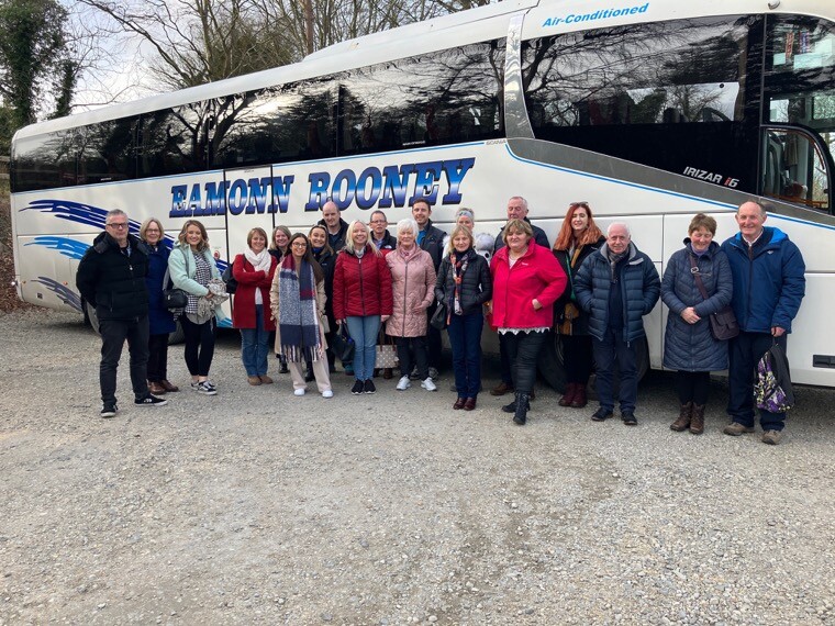 Representatives from local tourism businesses, Tourism Ireland, Tourism Northern Ireland and Visitor information Centre staff arrive by coach in Downpatrick to begin a tour of tourism attractions and experiences in the area organised by Newry, Mourne and Down District Council.