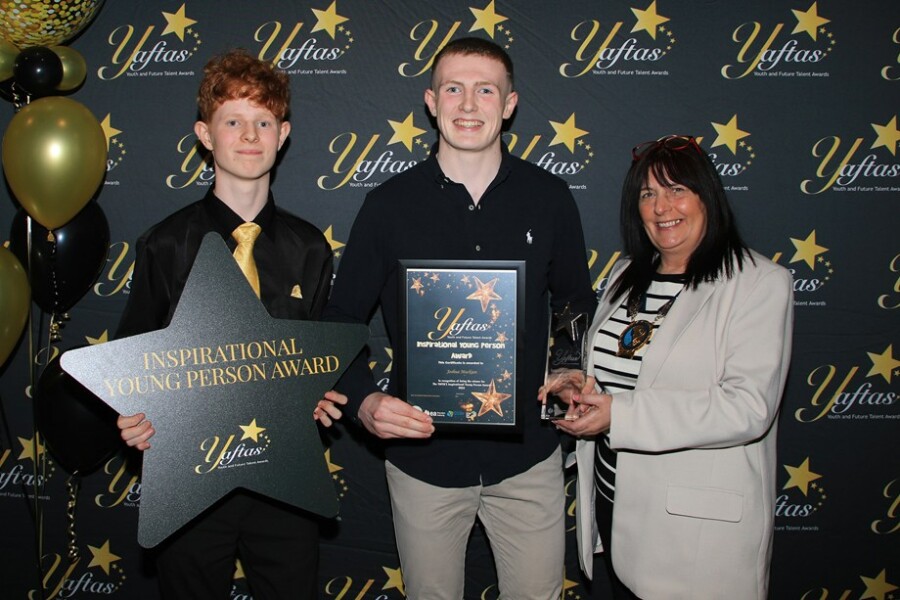 The Inspirational Young Person Award Winner was Josh Muckian who is pictured accepting his YAFTA award from Thomas Tiernan and Newry, Mourne and Down Council Chairperson Councillor Valerie Harte.