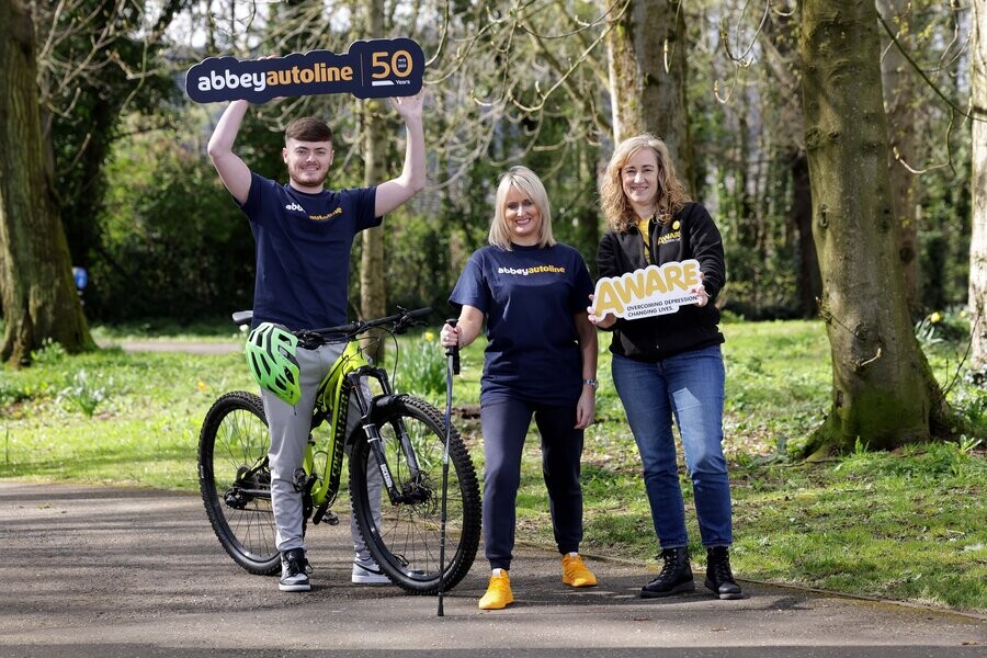 Getting ready for their challenge are from left: Josh Clarke, Trainee Insurance Technician at AbbeyAutoline, Lynsey Otter, Senior Branch Support Manager at AbbeyAutoline and Lisa Abell-Farrelly, Corporate Partnership Officer at AWARE.