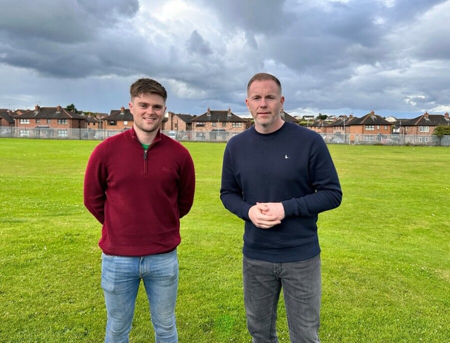 South Down MP Chris Hazzard and Cllr Michael Rice at the Scrogg Road playing field in Kilkeel 