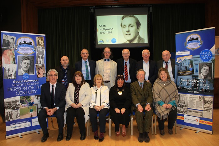 The Platform Party at St Colman's College for the unveiling of an Ulster History Circle Blue Plaque. front row l-r Cormac McKinney Principal, Helena Young Newry Maritime Association, Patricia Slevin (Sean's Sister), Council Chairperson, Councillor Valerie Harte, Chris Spurr Chairman Ulster History Circle, Eibhlin Mhic Aoidh Vice Chair Ulster History Circle, back ro l-r David Pearse Actor and past pupil, Kenneth Irvine UHC Personal reflections of Sean, Donal O'Hanlon Chairman/Director Newpoint Players, Sean Og McAteer Secretary Down County GAA, Rory McShane speaking on Sean's part in the Civil Rights Association, James McAreavey Chairman Newry Maritime Association. Photograph: Liz Boyle