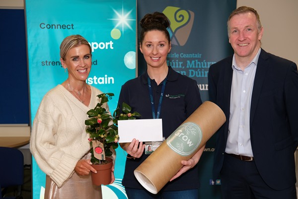Clanrye Group came second in the Social Enterprise NI Dragons Den event and Rachel Andrews, centre is pictured receiving a cheque for £500 from Carol Cox who made the presentation to the runner up on behalf of Oriel Developments Ltd while looking on is Phelim Sharvin, Community Finance Ireland. Photograph: Columba O'Hare/ Newry.ie