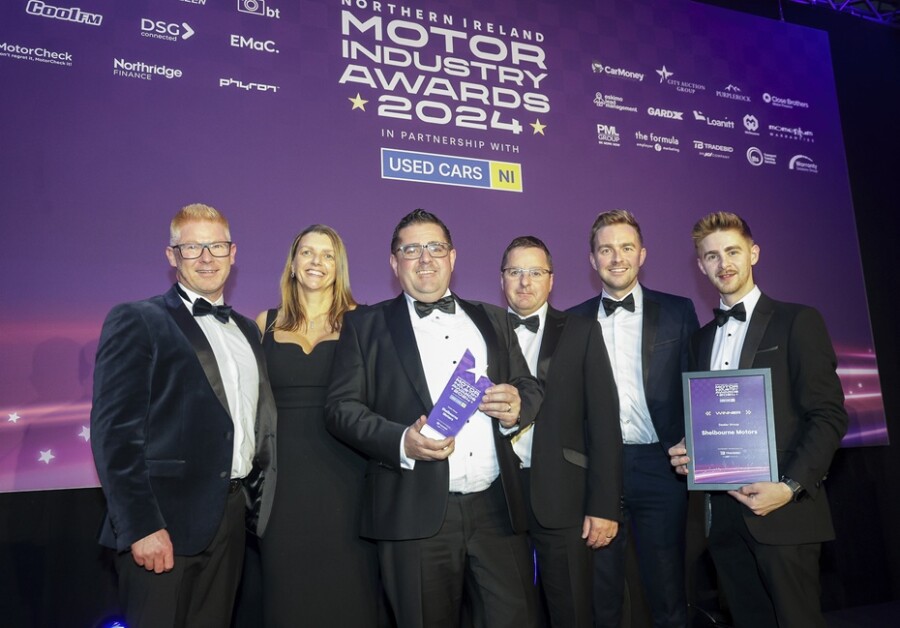 Alan Thompson, Caroline Willis, Paul Ward, Richard Ward and Jack Ward from Shelbourne Motors, proudly accepting the Dealer Group Award from Conor O’Boyle of category sponsor, TradeBid, at the prestigious Northern Ireland Motor Industry Awards 2024. The award ceremony, held at the Crowne Plaza Belfast, brought together over 600 industry professionals to honour outstanding achievements across Northern Ireland’s automotive sector.