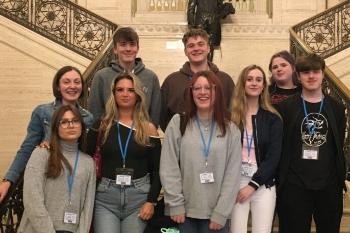 SRC students who attended the Stormont Debates. Pictured back from left: Andrew Graham, Arturs Sulte, Kassie Blanton Middle from left: Emily Boyd [Government & Politics Lecturer], Karolina Griskeviciute, Carolyn Woods, Maebh McGuiness, Nathan Ritchie Front: Celine Corhea. 