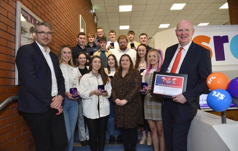 Successful competitors from the recent WorldSkills UK competition pictured alongside Ben Blackledge, Interim Chief Executive, WorldSkills (left), Louise Watson- Director of Further Education, Department for the Economy (centre), and Brian Doran, CEO at SRC