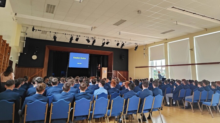 Theresa Burke speaking at St. Colmans College Newry.jpg