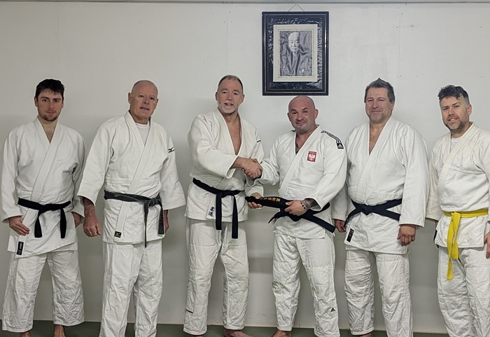 Dawid Jurkiewicz receiving his 2nd black belt