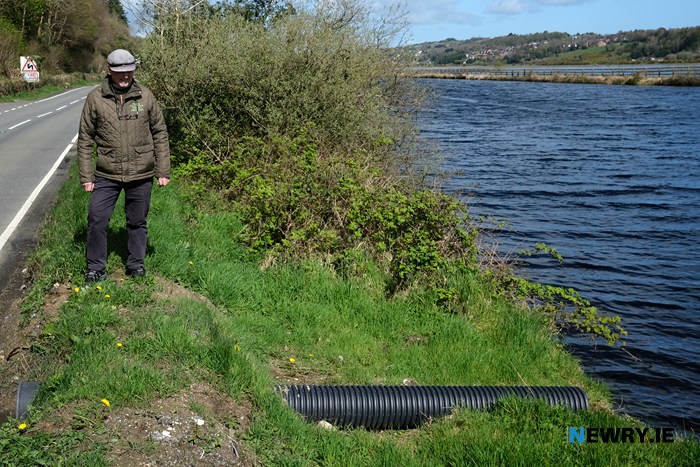 Oliver McGauley at another of the pipes. Photograph: Columba O'Hare/ Newry.ie 