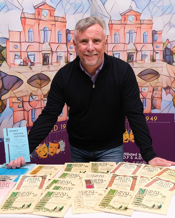Declan McConaghy with his collection of Newry Drama Festival programmes.