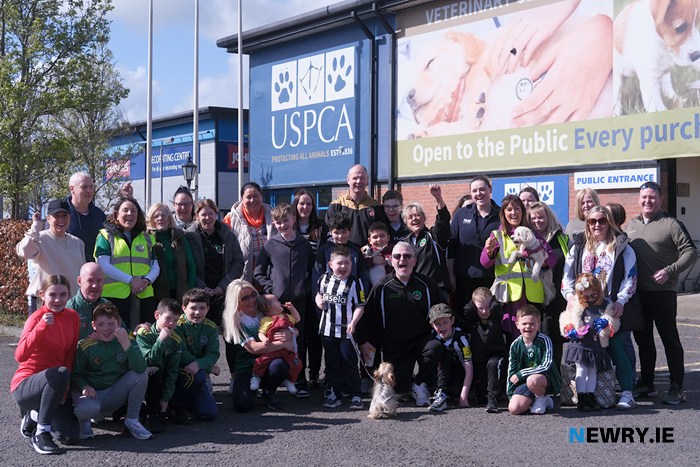 Team Alfie helping him finish his 40 mile challenge. Photograph: Columba O'Hare/ Newry.ie 