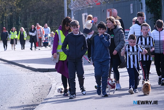 Alfie Pentony and Gizmo and supporters walk the final mile of his 40 mile challenge. Photograph: Columba O'Hare/ Newry.ie 