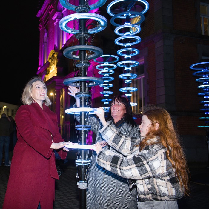 Chairperson, Councillor Valerie Harte is photographed with Jacqueline Barker, Newry, Mourne and Down District Council Arts Development Manager and Cara Quin at the launch of the immersive temporary art installation, Illumaphonium: Halo.  The installation is at Sugar Island, Newry and will run until Thursday 29 February.