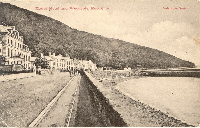Postcard showing the hotel (on left) when it was called the Mourne Hotel. The building commanded stunning views over Carlingford Lough. Newry and Mourne Museum Collection