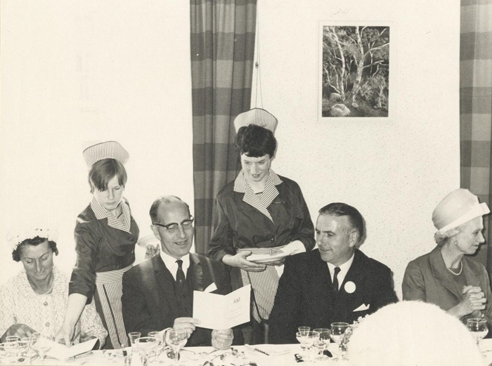 Photograph of Captain Terence O'Neill, Prime Minister of Northern Ireland, and his wife Jean's visit to Newry Catering College during Civic Week in 1968. O’Neill officially opened the Civic Week, which consisted of nine days of events “devised to interest the citizen and attract the visitor” to Newry. Newry and Mourne Museum Collection