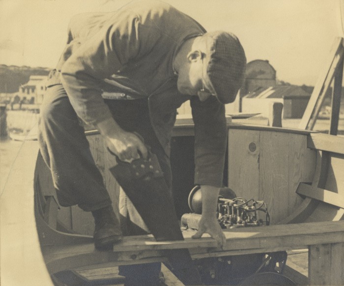 A Boat builder at work in the Mackintosh boat yard in the 1940s. Courtesy of the McGonigle Family