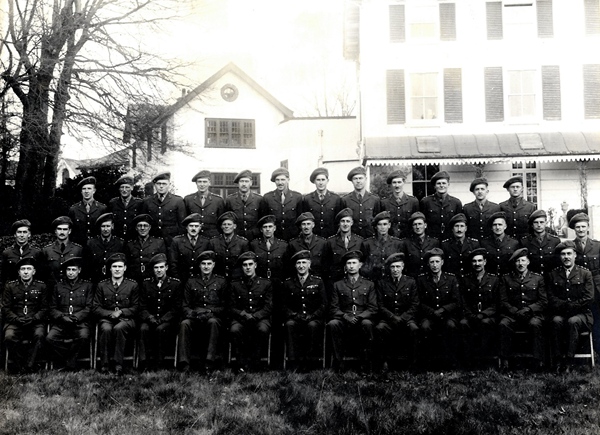 Major Gerald Reside pictured (front row, fifth from left) in France or Belgium with his fellow Royal Artillery officers, c.1944. Newry & Mourne Museum Collection