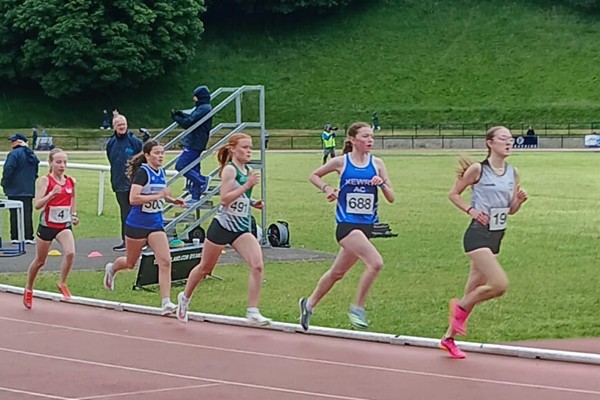 Megan running the 3000M