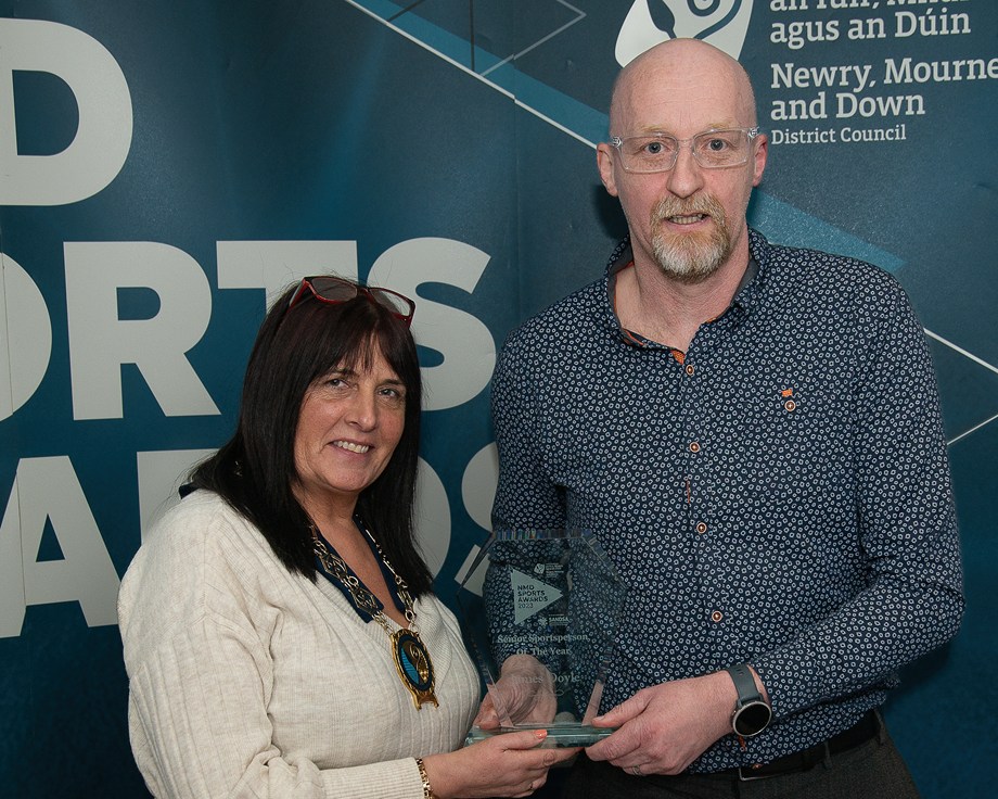 Newry, Mourne and Down District Council Chairperson, Councillor Valerie Harte presents James Doyle from St Killian’s GAA Handball Club with the Senior Sportsperson of the Year Award.