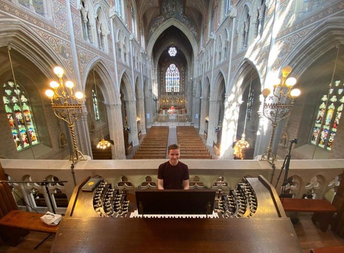 Daire playing the Great Organ at Armagh Cathedral. Photograph: Niall Downey