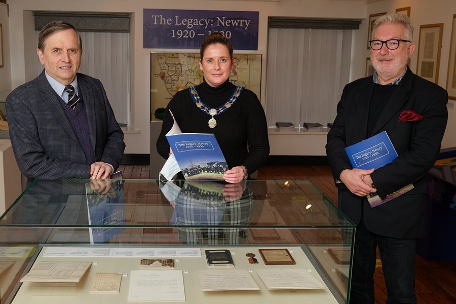 Pictured at the opening of 'The Legacy: Newry 1920 - 1930' exhibition at Newry and Mourne Museum. Included from left are: Professor Brian Walker, QUB, who wrote about Viscount Craigavon in the book accompanying the exhibition; Cllr Oonagh Magennis, Vice Chairperson, Newry, Mourne and Down District Council, who opened the exhibition and Tom Kelly, who contributed exhibits from his Grandfather, also Tom Kelly, who fought in the War of Independence. Photograph: Columba O'Hare/ Newry.ie