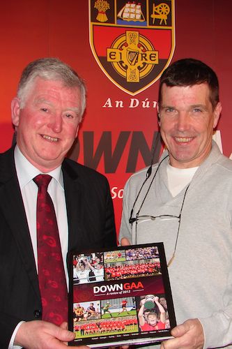 Seamus Walsh, Down County Chairman with County PRO Paul Rooney and the 2012 Down GAA Yearbook.
