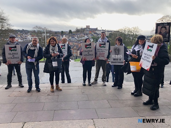 Protestors stand on the steps of St Patrick's Cathedral in Armagh. Photograph: Columba O'Hare/ Newry.ie 