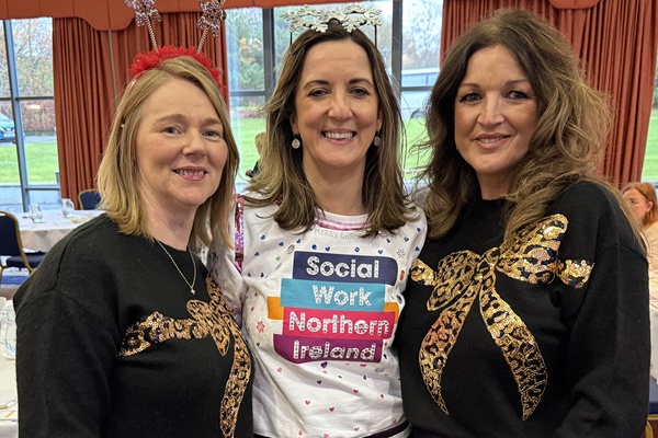 Staff were encouraged to wear their Christmas jumpers to the event with Marsha Begley (centre) winning first prize for her design. 