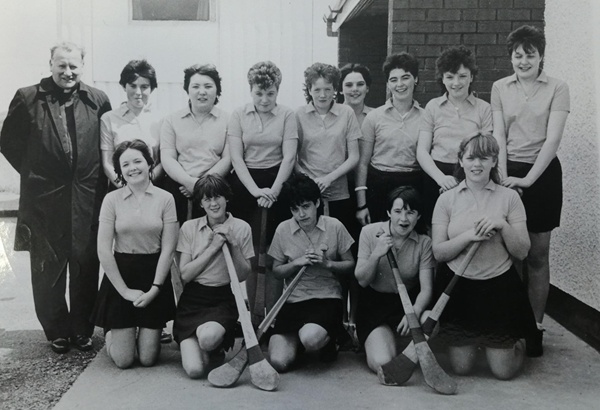 The Down camogie team pictured with Reverend Fr. Davis in Ballyholland at the camogie finals in 1985. Newry and Mourne Museum Collection 