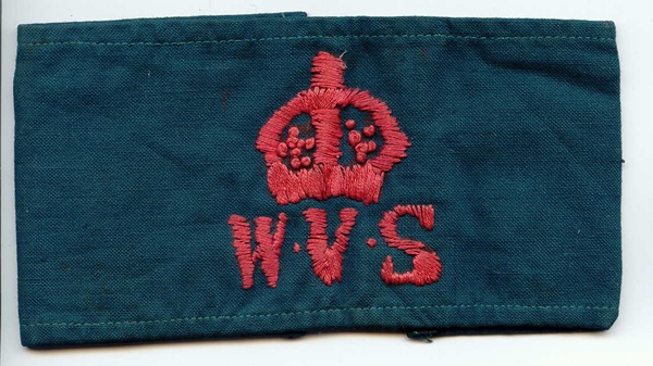 Hand embroidered armband worn by a member of the W.V.S. Newry & Mourne Museum Collection