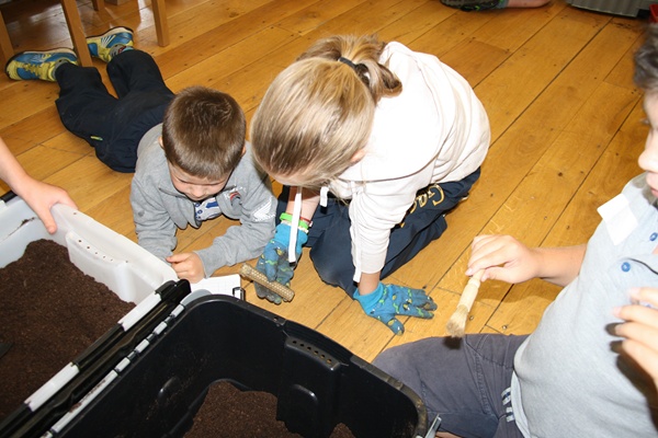 Children at an ‘archaeological dig’ at Newry and Mourne Museum Summer Camps. Newry and Mourne Museum Collection