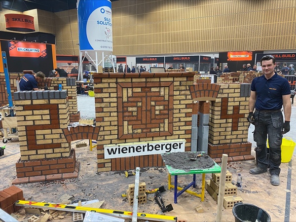Matthew Carswell with his bricklaying handiwork at the 2024 SkillBuild National Finals 