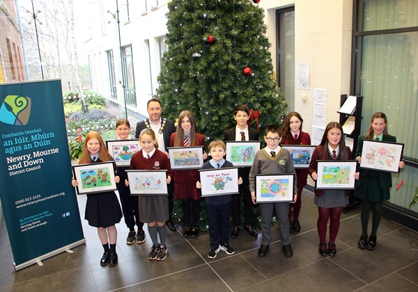 Newry, Mourne and Down District Council Chairperson, Councillor Pete Byrne, pictured with the winners of the Schools Environmental Poster Competition in Downpatrick for this year’s prize giving event (L-R) Rebecca Rodgers, St Dallan’s Primary School, Warrenpoint; Anna Rose McNeill, St Monnina’s Primary School, Cloughoge; Cate Coffey, St Colman’s Primary School Saval, Ollie Kearney, St Malachy’s Primary School, Castlewellan and Maciej Libera Abbey Christian Brothers’ School, Newry; Adam Briggs Glasswater Primary School, Crossgar; Aiobh McGrath St Mary’s High School, Newry, Emer O’Neill St Paul’s High School, Bessbrook and Hannah Begley, Sacred Heart Grammer School, Newry.