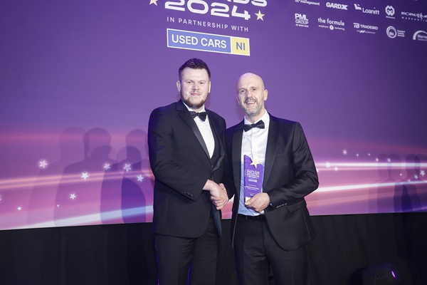 David Armstrong, right,  proudly accepts the After Sales Manager award from Daniel Stant (L), Sales Development Manager at EMAC, category sponsor.