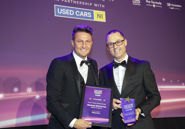 Michael McCartan, right, proudly accepts the Dealer Principal / General Manager award from Ciaran McGurgan, Commercial Sales Executive at Abbey Autoline, category sponsor.