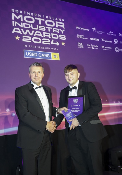 Gareth Atkinson, right,  proudly accepts the Automotive Technician award from Michael Strain, Chief Executive Officer at Transport Training Services. category sponsor