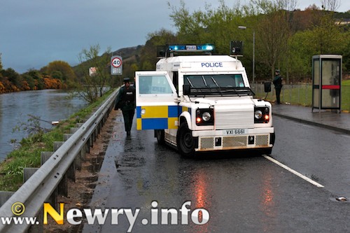 PSNI officers close off the Omeath Road due to a suspicious vehicle at the side of the road between Newry and Omeath. Picture: Columba O'Hare