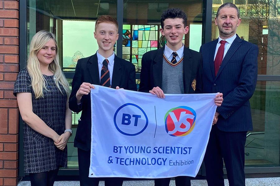 Year 12 Abbey Christian Brothers Grammar School pupils Ben Mooney and John Paul McGreevy are congratulated on their win by Science Teacher Sarah Kee and Principal Sean Sloan. 