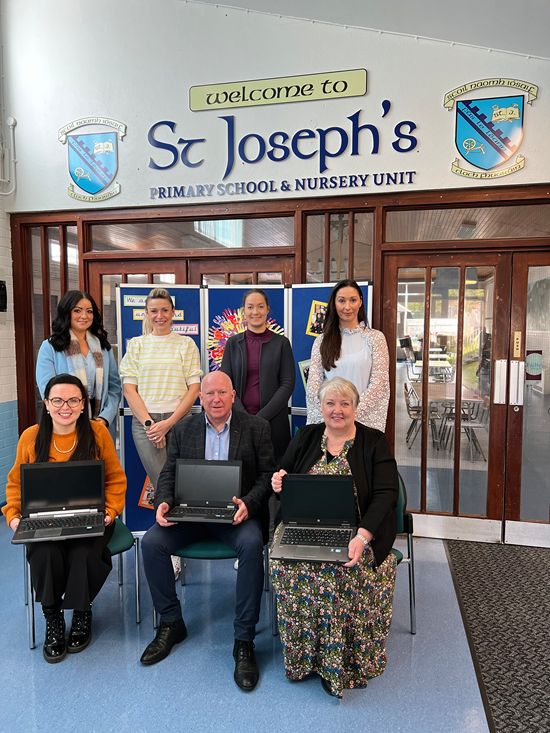 Pictured at the launch of the 'Back to Schools' initiative is front from left: Miss Smith, ICT Coordinator, St Joseph's PS, Bessbrook, Eamon Magee, Water Solutions, Mrs Hannaway, Principal, St Joseph's PS, Bessbrook. Back: Jenny Savage, Water Solutions, Deborah Loughran, Newry Chamber Board member, Jessica Gray, Newry Chamber and Rachel Duffy, Clanrye Group.