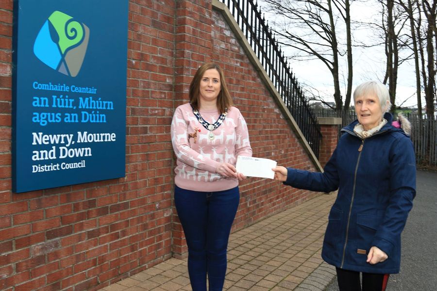 Newry, Mourne and Down District Council Deputy Chairperson, Councillor Oonagh Magennis presents a cheque to Newry and Mourne area President Rosemary Cunningham from St. Vincent De Paul, St. Brigid’s Conference as part of the Chairperson’s Christmas Appeal.