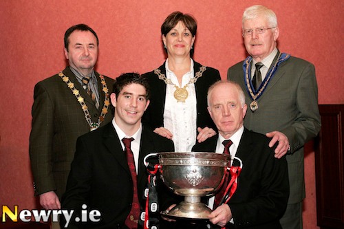 The late Jerry Quinn, front right in his capacity as Down County Chairman in 2006 with James Colgan, Captain of the winning 2005 All Ireland Minor Football team ; Clr Pat McGinn, Mayor, Newry and Mourne; Clr Carmel O'Boyle, Chairperson, Down District Council and Clr Patrick McAleenan, Vice Chairman, Banbridge District Council at a civic reception in Newry to mark the Down Minor Teams success in 2005.