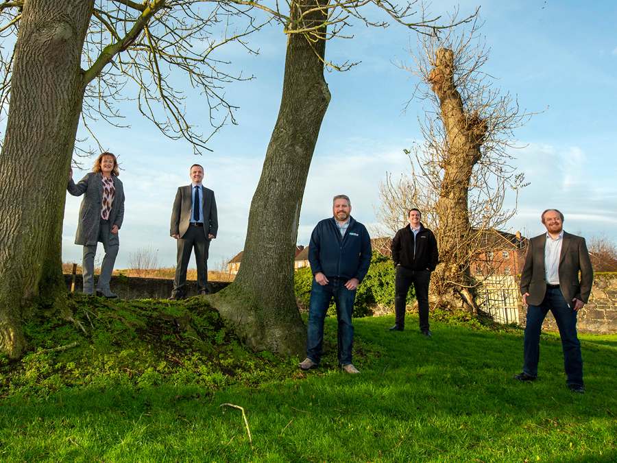 The Southern Trust Sustainability Team have achieved Gold status in the 2021 Arena Network Environmental Survey. Included from left are: Heather Brooks, Michael Cassidy, Geoff Flannagan and  Peter Douglas from the Estates Sustainability team with Andrew Cunningham, Acting Head of Estates Development Services.