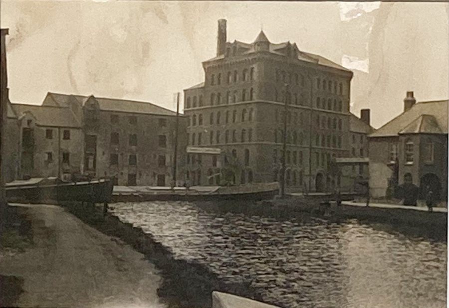 Sands’ Mill pictured c.1908 with the Turning Basin for the Canal barges in the foreground. Newry and Mourne Museum Collection