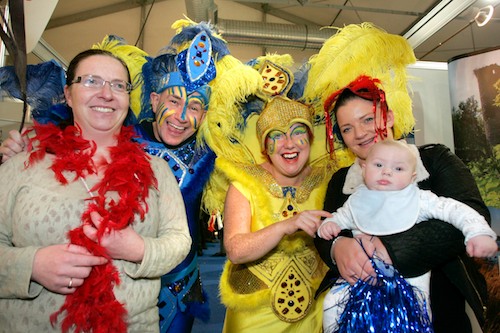 Pictured at the recent Holiday World Show at Belfast’s King’s Hall Pavilions with ‘The Latinos’ (Richard Orr and Christina Nelson) is Shannon, Christel and 4 month old Brodie Gibson from Newry.