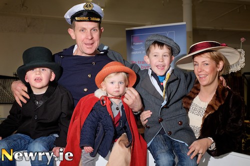 Colm and Emma Hurley from Burren with children Josh, Lauren and James celebrating the fact that they are 100 years too late for the Titanic at Explore, Engage, Enjoy at The Old Mill, Edward Street, Newry. The event was organised by the Ulster Folk and Transport Museum as part of the Small Size Big Festival. Photograph: Columba O'Hare
