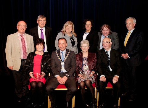 Mayor Mickey Ruane, Declan McAteer, Michael Carr, Karen McKevitt MLA, Gillian Fitzpatrick, Brian Quinn and Sean Rodgers MLA are pictured with award winners Teenie Wilson (Community Worker Burren Heritage Centre) along with Sean and Josephine O'Hare (Former Newry and Mourne Councillors). Photograph: Peter Clarke