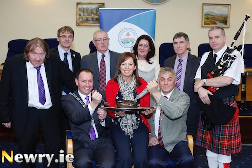 Getting ready for Burns Night celebrations tomorrow at the Newry and Mourne District Council Offices earlier today. From left: Cllr Brian Quinn; Gerard McGivern; Michael Ruane, Mayor; Thomas McCall, Chief Executive; Jessica Bennett, Internal Good Relations Officer; Ursuala Mhic an tSaoir, Irish Language Development Officer; William Burns, Chairman, Ulster Scots Committee; Cllr Harold McKee and Dessie Moorehead, Piper. Photograph: Columba O'Hare