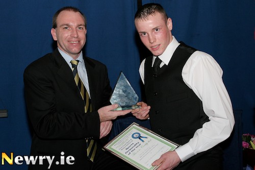 Blast from the past - Boxer Patrick Murphy gets his 2004 Sports Award from DJ Carey. Photograph: Columba O'Hare