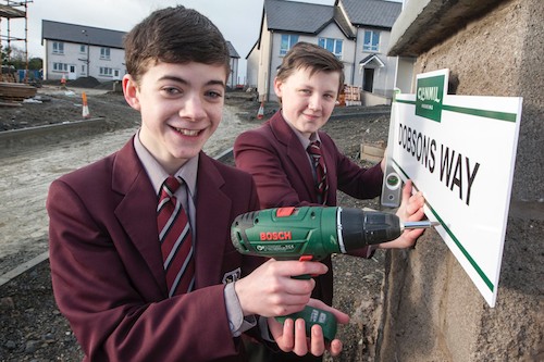 Year 9 pupils at St Paul's High School, Chea McArdle and Christian Mathews who suggested the winning name Dobsons Way for Clanmil Housing's new 62 home housing development in Bessbrook. Photograph: NewRay Pics