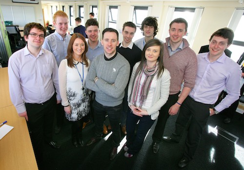 Relaxing after the Inspire To Work Day with presenter Connor Phillips are the B/E Aerospace Interns who planned and managed the event.  Back row, from left are Ben Whittaker, from Portrush, Engineering Intern in Composites, studying Mechanical and Aerospace Engineering at Queen’s University; Thomas McGeown, from Keady, Supply Chain Intern, studying Business Economics at University of Ulster;  Conleth McAlinden, from Lurgan, Quality Engineer Intern in Main Cabin studying Aerospace Engineering at Queen’s University; Rory Conroy from Keady, Supply Chain Intern, studying Business Economics at University of Ulster; Aaron Smyth, from Omagh,  Manufacturing Engineer Intern in Furnishings & Fittings,  studying Mechanical and Aerospace Engineering at Queen’s University; Robert Kane from Londonderry, Quality Engineer Intern in Premium studying Aerospace Engineering at Queen’s University; Philip Parr from Ballygawley, Engineering Intern in Main Cabin, studying Mechanical and Aerospace Engineering at Queen’s University.  Front row, from left, Kristin McCartney from Kilkeel studying Business at University of Ulster and  Rachel Curran, also from Kilkeel,  ICT Intern from Kilkeel studying Computing and Information Technology at Queen’s University.