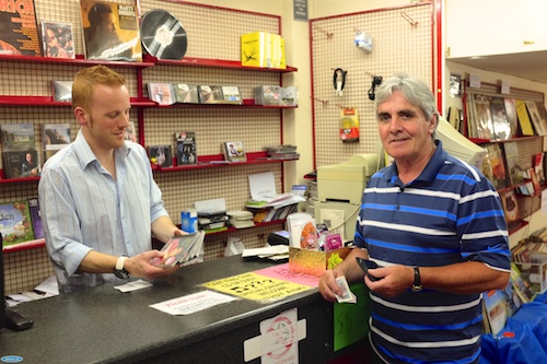 Peter Poland the very last customer at Carlin Records in Newry gets served by owner Darran Turtle. Photograph: Columba O'Hare Peter Poland the very last customer at Carlin Records in Newry gets served by owner Darran Turtle. Photograph: Columba O'Hare